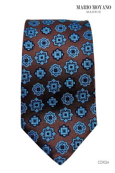 Cravate en soie marron et pochette avec des médaillons bleus COR024 de Mario Moyano.