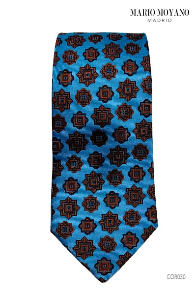 Corbata y pañuelo de seda azul con medallones de café COR030 de Mario Moyano.